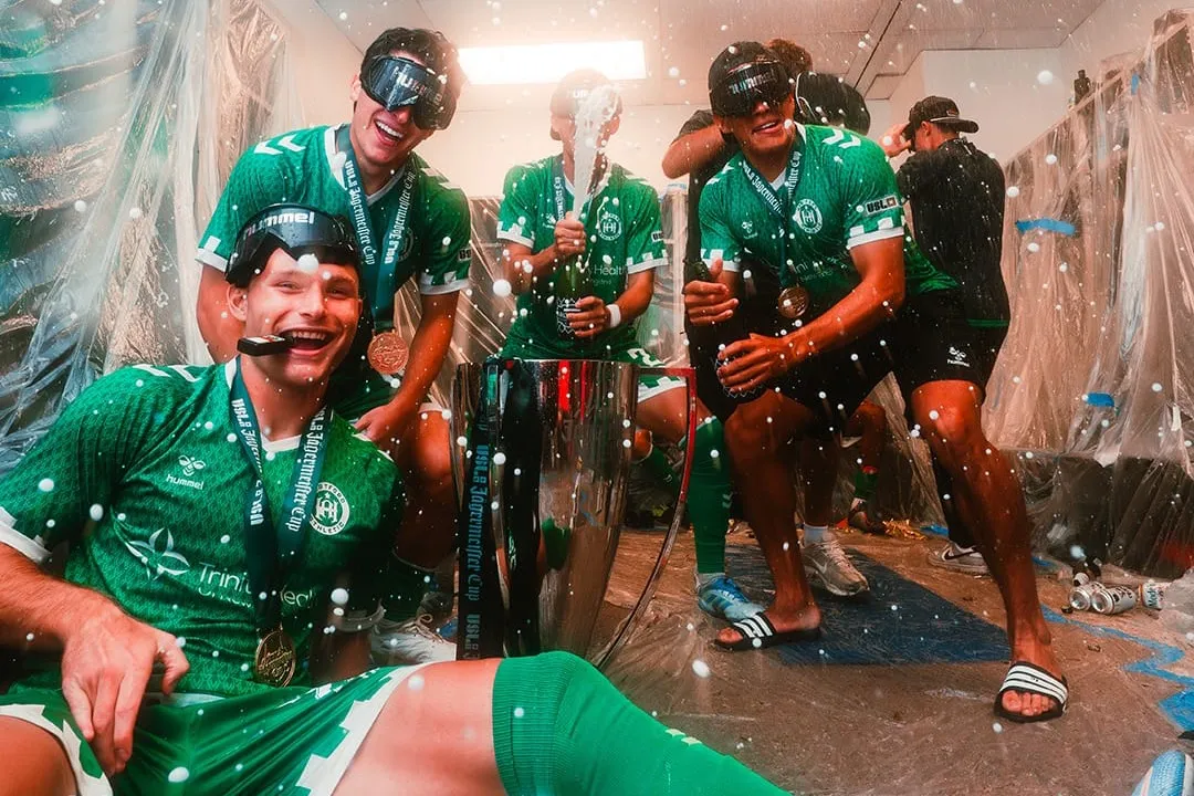 Hartford Athletic players celebrating in the locker room after winning the 2025 Jägermeister Cup