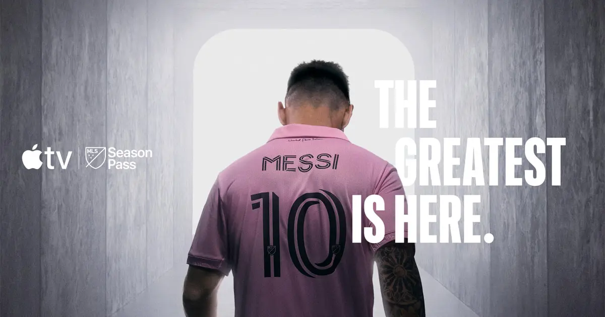 Rear view of Lionel Messi wearing a pink Inter Miami CF jersey with the number 10 and his name on the back